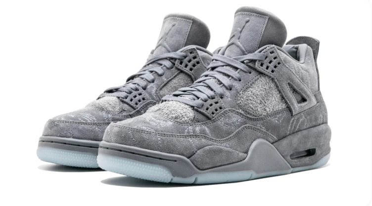 Air Jordan 4 Sneakers – Gray with Textured Pattern & Icy Blue Sole