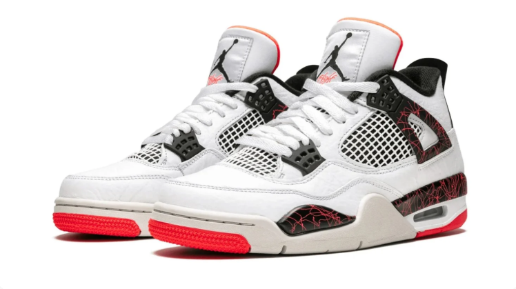Air Jordan 4 Sneakers – White & Black with Red Crackle Accents